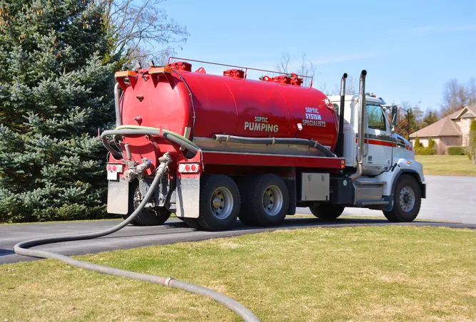 Septic truck pumping holding tank